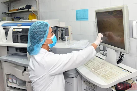 Nghiên cứu vaccine Nanocovax tại Học viện Quân y. (Ảnh: DUY LINH)