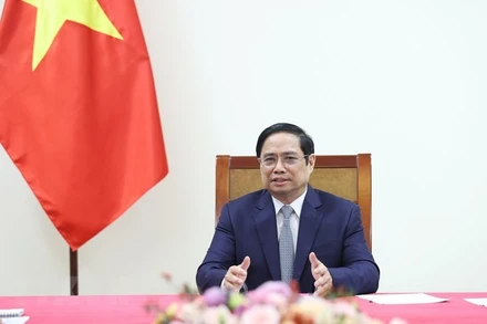 Thủ tướng Phạm Minh Chính điện đàm với ông John Kerry, đặc phái viên của Tổng thống Hoa Kỳ. (Ảnh: Dương Giang/TTXVN)