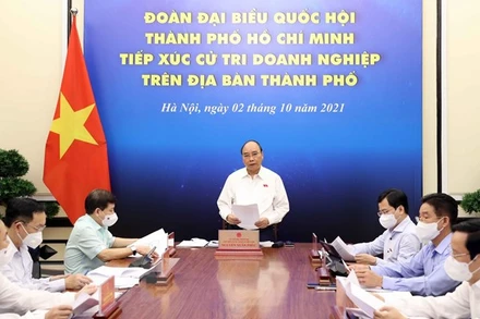 Chủ tịch nước Nguyễn Xuân Phúc phát biểu tại điểm cầu Hà Nội. (Ảnh: Thống Nhất/TTXVN)