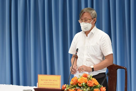 Chủ tịch UBND tỉnh Đồng Nai Cao Tiến Dũng kêu gọi công nhân ở lại khôi phục sản xuất.