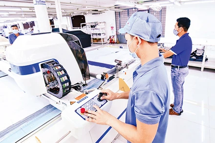 Lao động tại Công ty May Sài Gòn 3 (Ảnh minh họa: Quý Hiền).