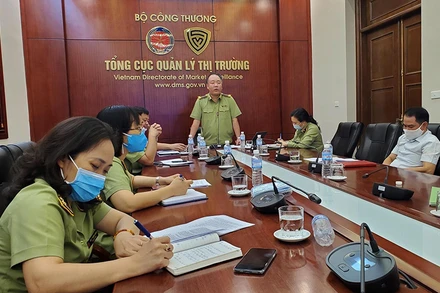 Tổng cục trưởng Quản lý thị trưởng Trần Hữu Linh phát biểu tại cuộc họp.