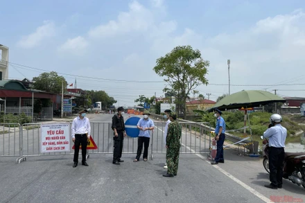 Chốt kiểm soát y tế phòng chống dịch Covid-19 giữa hai tỉnh Hải Dương - Bắc Ninh trên quốc lộ 38. (Ảnh minh họa)