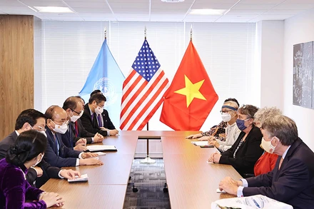 Chủ tịch nước Nguyễn Xuân Phúc tiếp đại diện bạn bè Hoa Kỳ nhân kỷ niệm 60 năm thảm họa da cam ở Việt Nam. (Ảnh: Thống Nhất/TTXVN)