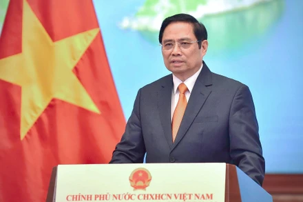 Thủ tướng Phạm Minh Chính phát biểu tại Hội nghị thượng đỉnh thương mại dịch vụ toàn cầu năm 2021. (Ảnh: VGP)