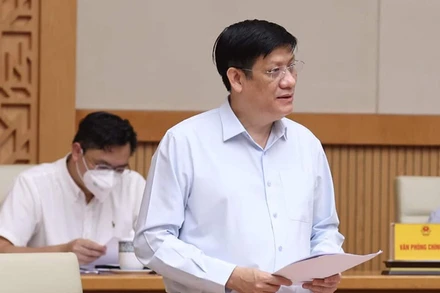 Bộ trưởng báo cáo tại cuộc họp. (Ảnh: DƯƠNG GIANG)