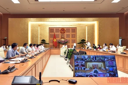 Hội nghị trực tuyến thúc đẩy lưu thông, tiêu thụ nông sản trong bối cảnh phòng, chống dịch Covid-19. (Ảnh: ĐỨC TUÂN).