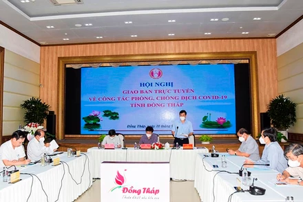 Chủ tịch UBND tỉnh Đồng Tháp Phạm Thiện Nghĩa phát biểu tại hội nghị.