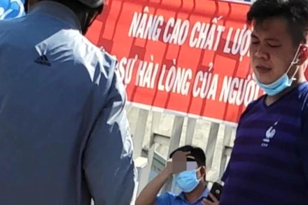 Đối tượng Lê Văn Thắng (bên phải) bị khởi tố, tạm giam.    