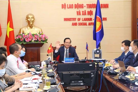 Bộ trưởng Lao động - Thương binh và Xã hội Đào Ngọc Dung tham gia ý kiến tại hội nghị trực tuyến ASCC lần thứ 26.