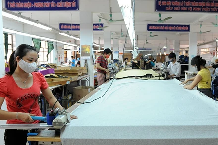 Sản xuất tại công ty may Đáp Cầu (Bắc Ninh). (Ảnh: Thanh Hải)