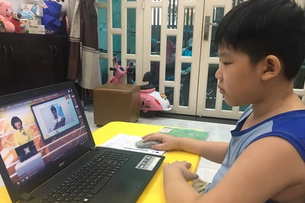 Học sinh các cấp ở TP Hồ Chí Minh sẽ học trực tuyến hết học kỳ I năm học 2021-2022. (Ảnh: QUANG QUÝ). 