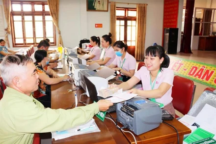 Điểm giao dịch của NHCSXH ở xã Nghi Phú, TP Vinh (Nghệ An).