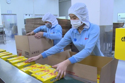 Sản xuất bánh, kẹo tại Công ty TNHH Thực phẩm Orion Vina, Khu công nghiệp Mỹ Phước II, thị xã Bến Cát, Bình Dương.