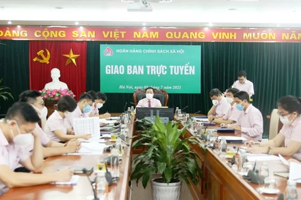 Toàn cảnh cuộc họp về tín dụng chính sách.