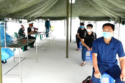 Huyện Thanh Oai diễn tập vận hành khu cách ly tập trung phòng, chống dịch Covid-19. (Ảnh: NGUYỄN ĐUA)