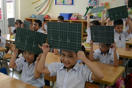 Học sinh lớp 1. Ảnh: DUY LINH