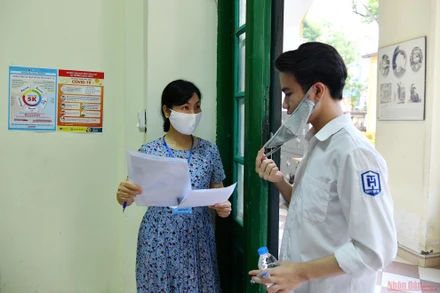 Tại Kỳ thi tốt ngiệp THPT năm 2021. Ảnh: THUỶ NGUYÊN