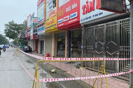 Một khu vực bị phong tỏa, cách ly vì liên quan ca mắc Covid-19 trên đường Điện Biên, TP Nam Định.