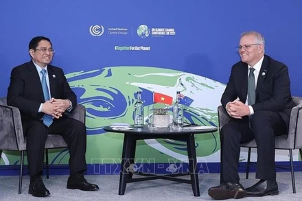 Thủ tướng Phạm Minh Chính gặp Thủ tướng Australia Scott Morrison. (Ảnh: Dương Giang/TTXVN)