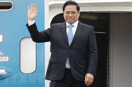 Thủ tướng Phạm Minh Chính lên đường thăm chính thức Nhật Bản. (Ảnh: Dương Giang/TTXVN)