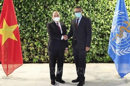 Chủ tịch nước Nguyễn Xuân Phúc gặp Tổng Giám đốc Tổ chức Y tế thế giới Tedros Adhanom Ghebreyesus. (Ảnh: TTXVN)