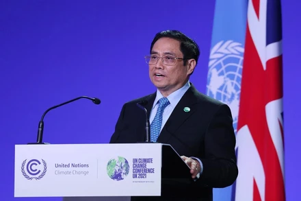 Thủ tướng Phạm Minh Chính phát biểu tại Hội nghị thượng đỉnh khí hậu được tổ chức trong khuôn khổ Hội nghị lần thứ 26 các Bên tham gia Công ước khung của Liên hợp quốc về Biến đổi khí hậu (COP26), Glasgow, Scotland, Vương quốc Anh. (Ảnh: TTXVN) 