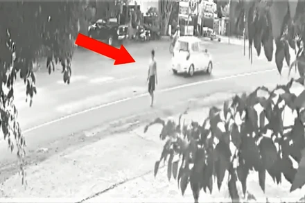 Camera của người dân ghi lại hình ảnh đối tượng Thi Thanh Sơn cầm dao rựa đến trước cổng trụ sở Công an phường Thiện An, thị xã Buôn Hồ la hét, chửi bới gây rối.