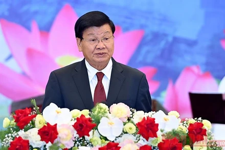 Tổng Bí thư, Chủ tịch nước Lào Thongloun Sisoulith đọc diễn văn đáp từ. Ảnh: Đăng Khoa.