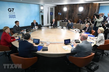 Theo chiều kim đồng hồ, từ trái sáng phải: Thủ tướng Đức Angela Merkel, Tổng thống Pháp Emmanuel Macron, Thủ tướng Anh Boris Johnson, Tổng thống Mỹ Joe Biden, Thủ tướng Canada Justin Trudeau, Thủ tướng Italy Mario Draghi, Chủ tịch Ủy ban châu Âu Ursula vo. Ảnh: TTXVN.