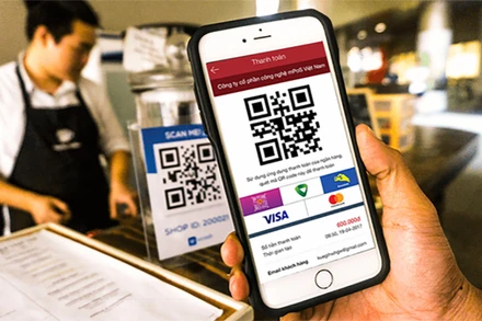QR code - một hình thức thanh toán không tiền mặt. (Ảnh: tapchitaichinh.vn)