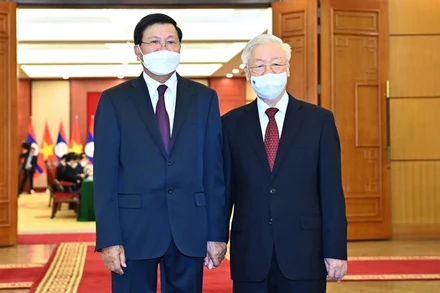 Tổng Bí thư Nguyễn Phú Trọng đón Tổng Bí thư, Chủ tịch nước Lào Thongloun Sisoulith. (Ảnh: ĐĂNG KHOA)