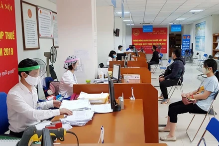 Cục Thuế Hà Nội vừa bảo đảm nhiệm vụ công tác vừa phòng, chống dịch Covid-19. (Ảnh minh họa).