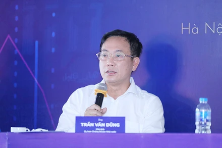 Chủ tịch Ủy ban Chứng khoán Nhà nước Trần Văn Dũng chia sẻ tại Tọa đàm “Nghẽn lệnh HoSE: Thực trạng và Giải pháp” tổ chức ngày 24-6. (Ảnh: Quang Phúc)