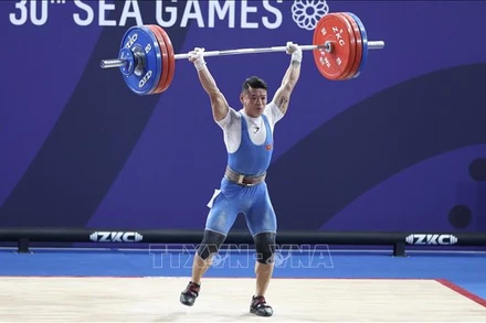 Vận động viên cử tạ Kim Tuấn từng giành Huy chương Bạc ở hạng cân 61kg tại kỳ SEA Games 30.