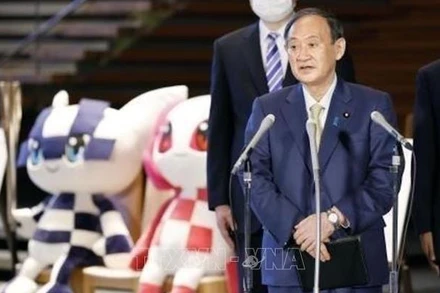 Thủ tướng Nhật Bản Suga Yoshihide phát biểu với báo giới tại Tokyo, Nhật Bản ngày 10-6-2021, trước khi lên đường tới Anh dự hội nghị thượng đỉnh G7. (Ảnh: Kyodo/ TTXVN)