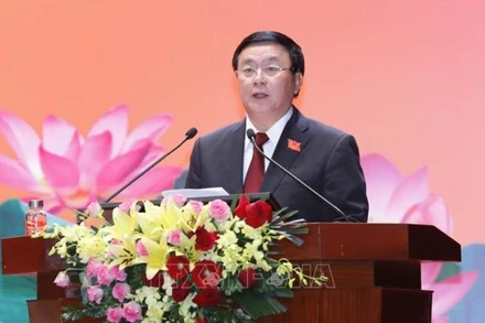 Đồng chí Nguyễn Xuân Thắng, Ủy viên Bộ Chính trị, Chủ tịch Hội đồng Lý luận Trung ương, Giám đốc Học viện Chính trị quốc gia Hồ Chí Minh phát biểu tại tọa đàm. (Ảnh: TTXVN)