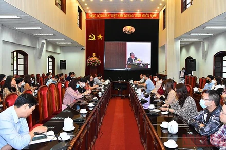 Cán bộ, phóng viên, biên tập viên Báo Nhân Dân tham dự Hội nghị tại điểm cầu Trụ sở Báo Nhân Dân (71 Hàng Trống, Hà Nội). (Ảnh: THỦY NGUYÊN)