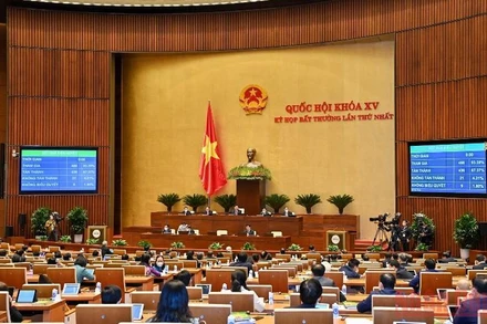 Lần đầu tiên Quốc hội thông qua “1 luật sửa nhiều luật”. (Ảnh: LINH KHOA)