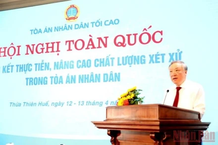 Ủy viên Bộ Chính trị, Bí thư Trung ương Đảng, Chánh án Tòa án Nhân dân tối cao Nguyễn Hòa Bình phát biểu khai mạc hội nghị. (Ảnh: NGUYÊN ANH) 