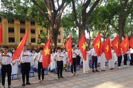 Học sinh Trường THPT Phan Đình Phùng trong lễ khai giảng năm học mới (Ảnh: HƯƠNG LÝ)