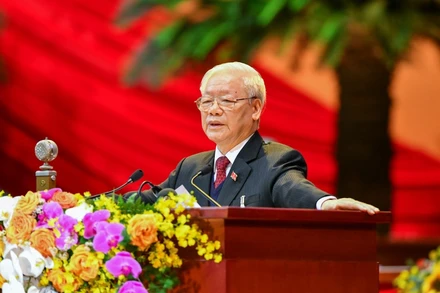 Đồng chí Nguyễn Phú Trọng, Tổng Bí thư, Chủ tịch nước đọc Báo cáo của Ban Chấp hành Trung ương khóa XII về các văn kiện Đại hội XIII của Đảng.