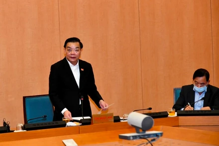 Chủ tịch UBND thành phố Hà Nội Chu Ngọc Anh phát biểu tại hội nghị của Ban Chỉ đạo phòng, chống Covid-19 thành phố Hà Nội, tối 28-1.