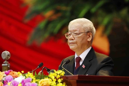 Đồng chí Nguyễn Phú Trọng, Tổng Bí thư Ban Chấp hành T.Ư Đảng, Chủ tịch nước CHXHCN Việt Nam đọc Báo cáo của Ban Chấp hành T.Ư Đảng khóa XII về các văn kiện trình Đại hội.