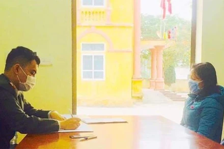 Chị H. làm việc với cơ quan chức năng.