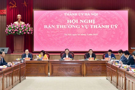 Quang cảnh hội nghị của Ban Thường vụ Thành ủy Hà Nội chiều 3-3.