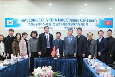 Các đại biểu tham dự lễ ký kết chụp ảnh kỷ niệm. (Ảnh: VKBIA)