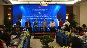 Các đại biểu thảo luận tại buổi tọa đàm.
