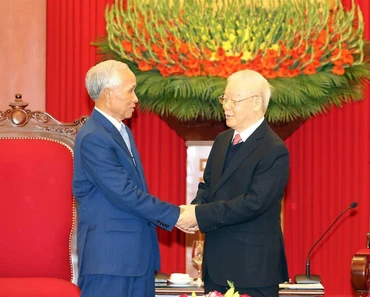 Tổng Bí thư Nguyễn Phú Trọng tiếp đồng chí Khamphan Pheuyavong. (Ảnh TTXVN)