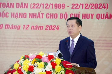 Đồng chí Nguyễn Long Hải đọc diễn văn ôn lại truyền thống 80 năm hào hùng của Quân đội nhân dân Việt Nam và 35 năm Ngày hội Quốc phòng toàn dân.